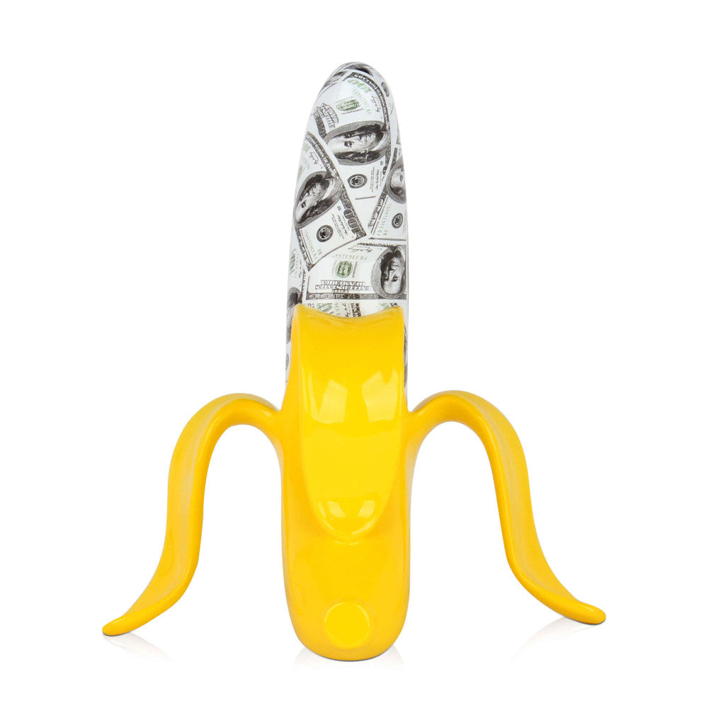 Banana statua in resina gialla e disegno di dollari